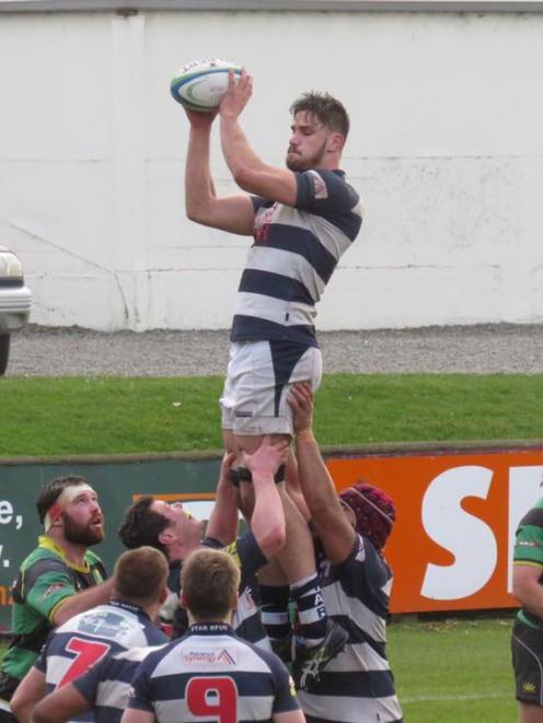 Star lineout jumper Maanaki Selby-Rickett takes a lineout throw during his team's 34-20 upset win...