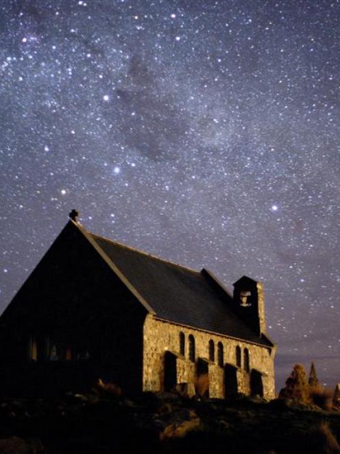 The Church of the Good Shepherd at Lake Tekapo with Southern Cross in the background. Photo by...