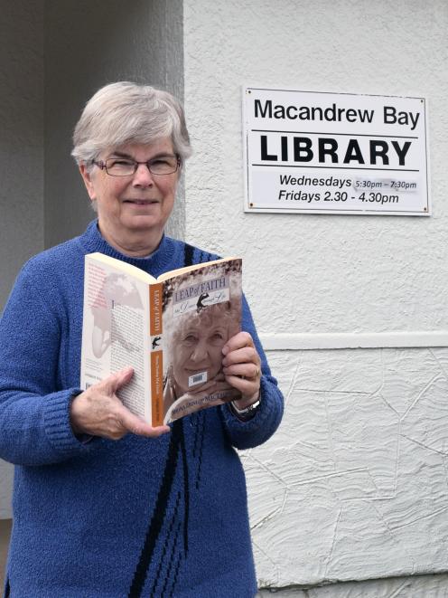 Macandrew Bay Library librarian Anne Pentecost prefers reading books to surfing the internet...