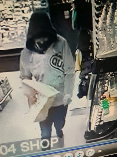 Security footage featuring a suspect from the earlier incident at the same service station on Friday. Photo: Supplied Security footage featuring a suspect from the earlier incident at the same service station on Friday. Photo: Supplied