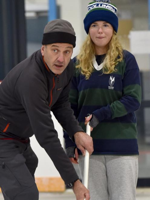 Simon Noble gives Georgia Ramsay (17), of Columba College, some tips.