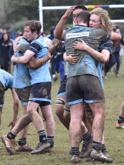 Kings celebrate their hard fought win at John McGlashan College today. 