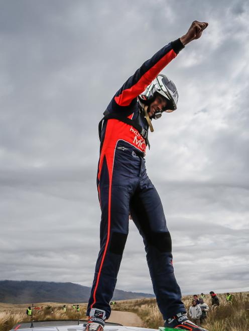 Hayden Paddon punches the air after winning Rally Argentina in 2016. Photo: McKlien Photography 