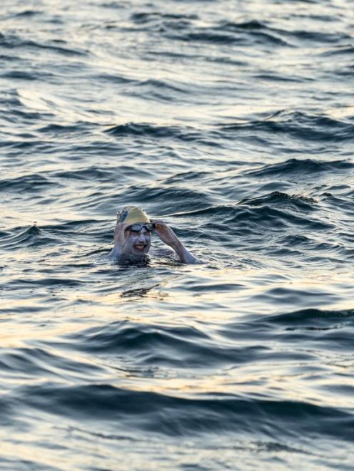 Sarah Thomas pauses during her swim in the English Channel. Photo: Twitter via Reuters