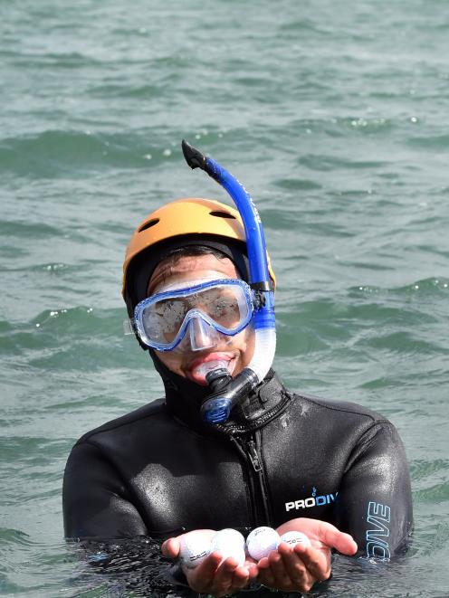 Duncan Campbell is among a team of snorkellers being employed to collect golf balls from the...