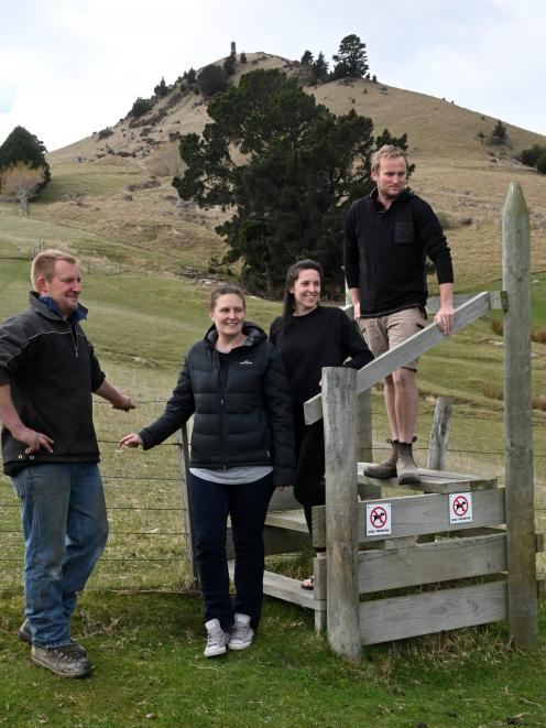 Matt and Hannah Hutcheson (left), and Chelsey and Aaron Johnston, are climbing Puketapu every day...