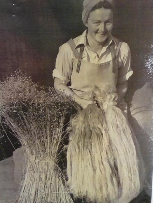 Methven's Phyllis Manning holds scutched linen flax fibre from the Methven factory in this 1946...