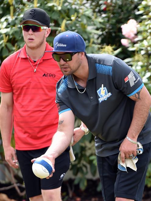 Eventual winner Shannon McIlroy, of Nelson, prepares to deliver a bowl as his opponent, Seamus...