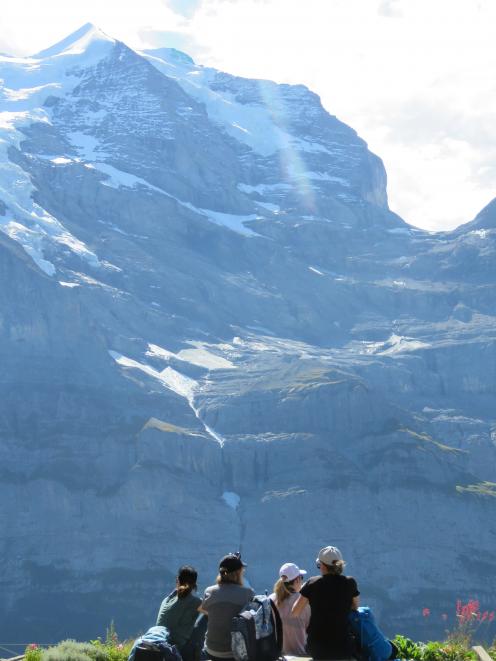 Dwarfed by the mighty Jungfrau on day two. PHOTO: SUPPLIED



