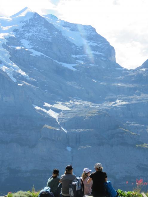 Dwarfed by the mighty Jungfrau on day two. PHOTO: SUPPLIED



