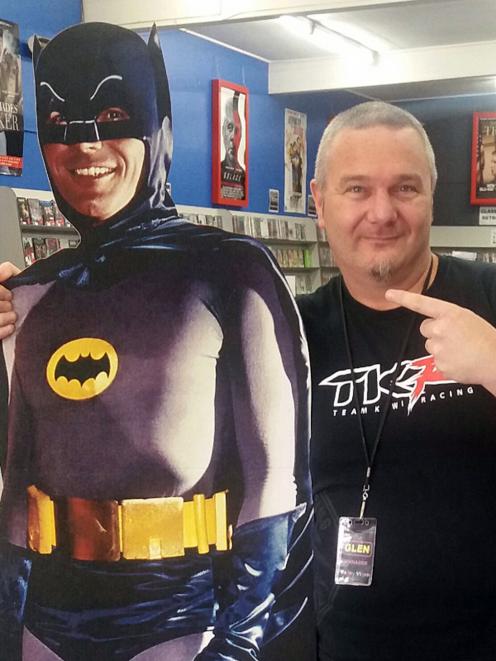 Former Valley Video manager Glen Edmondson poses with Batman. Photo: Supplied