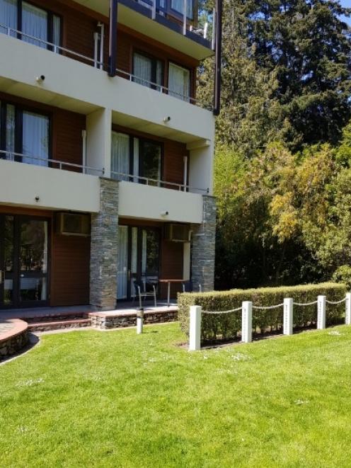 The child is believed to have fallen from the second floor balcony (at right).