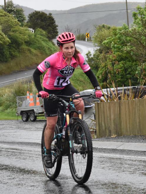 Claire Bell (Te Anau) rides on the 26km cycle stage of the Taieri Mouth Multisport Challenge...