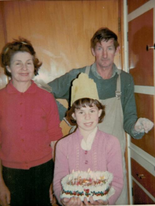 Bernie Mulcahy on her 10th birthday, with parents Rosalie and Brian. 