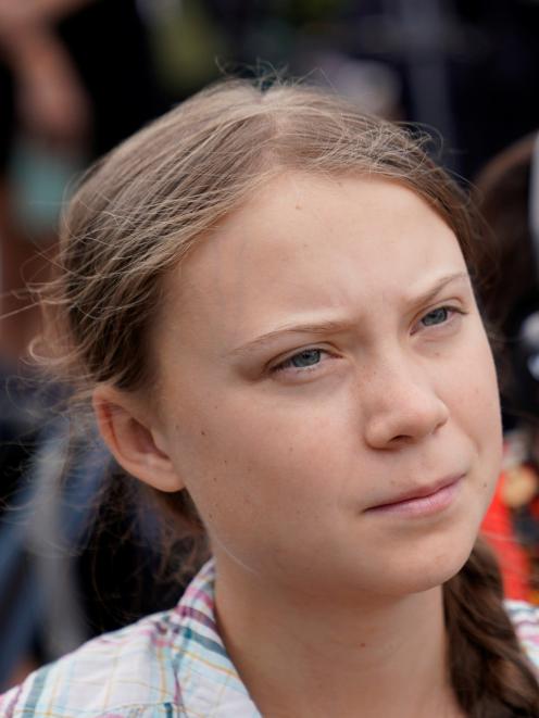 Swedish climate activist Greta Thunberg (16) listens to speakers at a climate change...