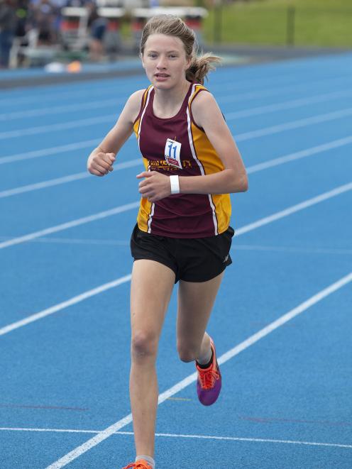 Amelia Henstock, 11, of the Christchurch Avon Athletics Club, is first across the line in the...