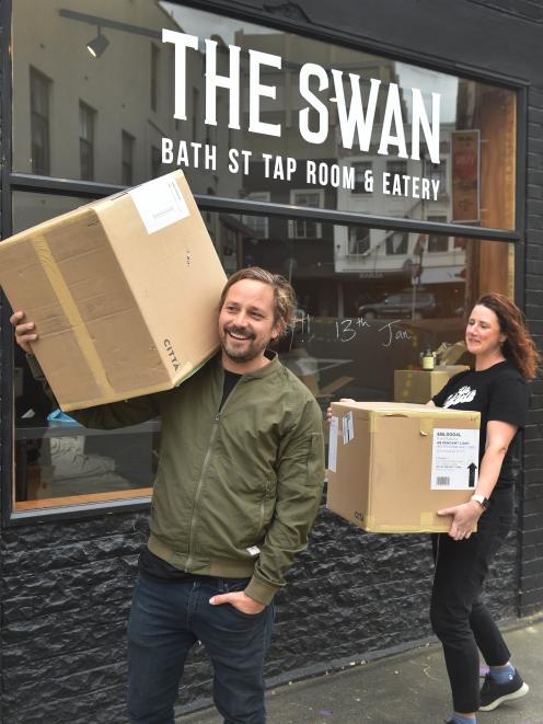 Patrick Hussey and Sarah Hussey are getting everything ready for The Swan's soft opening tonight. Photo: Peter McIntosh