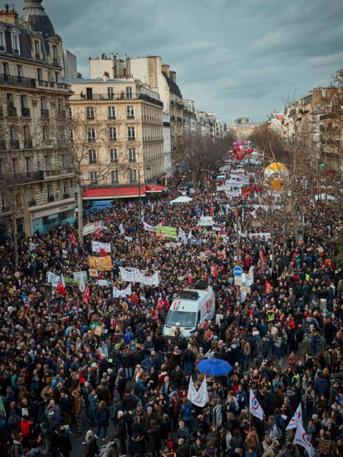 Thousands take to the streets of Paris in December to support the National strike over pension reforms. Photo: Getty Images