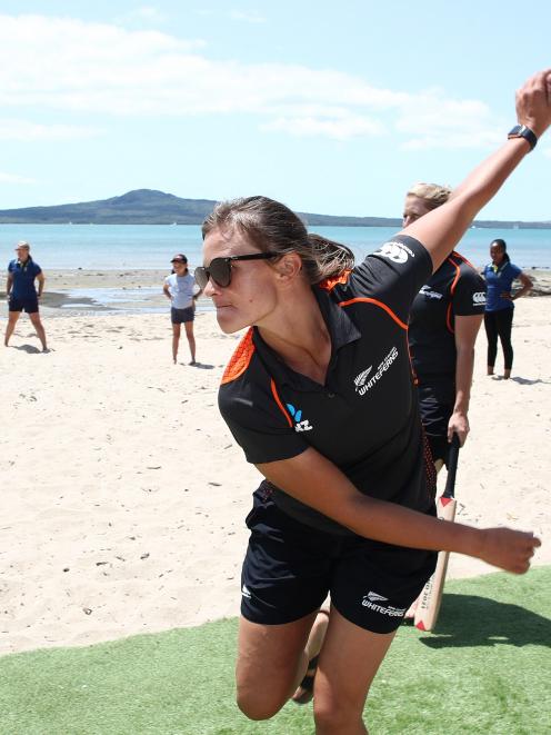 White Fern Suzie Bates bowls during a game of beach cricket held as part of the ICC Women’s...