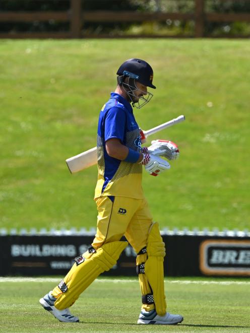 Otago opener Hamish Rutherford walks off the University of Otago Oval after smashing 155 against Central Districts on Sunday.