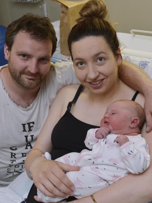 Cyle and Sarah Helm were enjoying their first hours with baby daughter Paige at Dunedin Hospital...