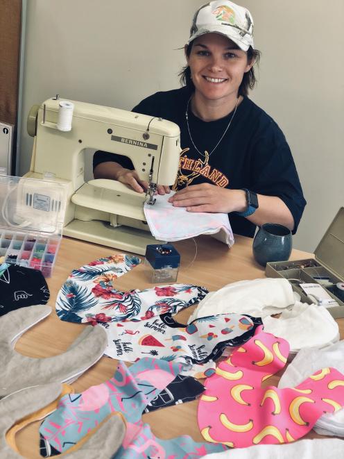 Barb Chittock sews bibs to sell as part of her Milk Mates business.
