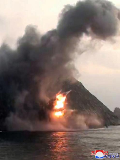 A missile explodes in the sea. Photo: KCNA via Reuters 