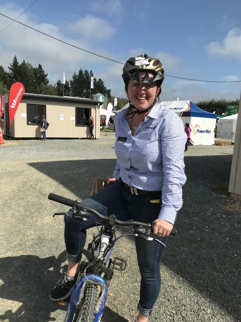 Beef and Lamb NZ extension manager Olivia Ross enjoyed the first day of the Southern Field Days visiting sites by bicycle. Photo: Alice Scott