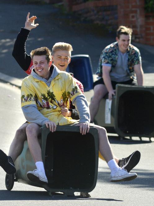 Students race wheelie bins down Union St West in North Dunedin last year. PHOTO: GERARD O'BRIEN