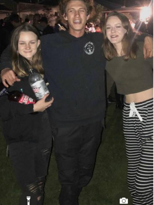 Sunmara (left) and Tayla Alexander with their brother Dallas Thomson.