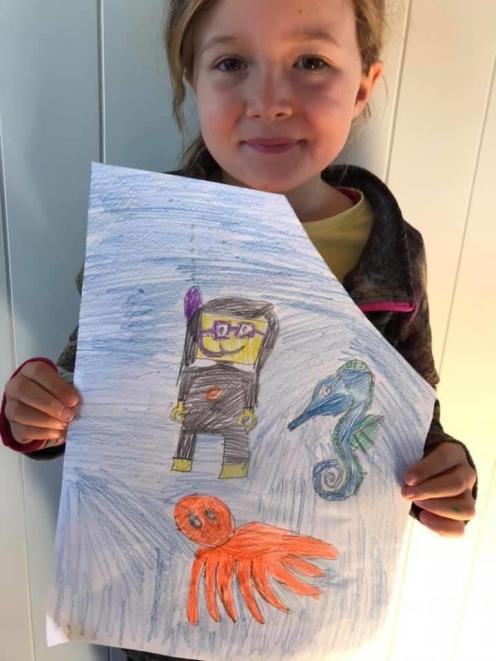 Olive Johnstone (6) drew a scuba-diving scene that won her a brand-new Lego set. PHOTO: SUPPLIED
