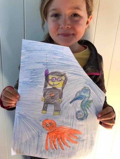 Olive Johnstone (6) drew a scuba-diving scene that won her a brand-new Lego set. PHOTO: SUPPLIED