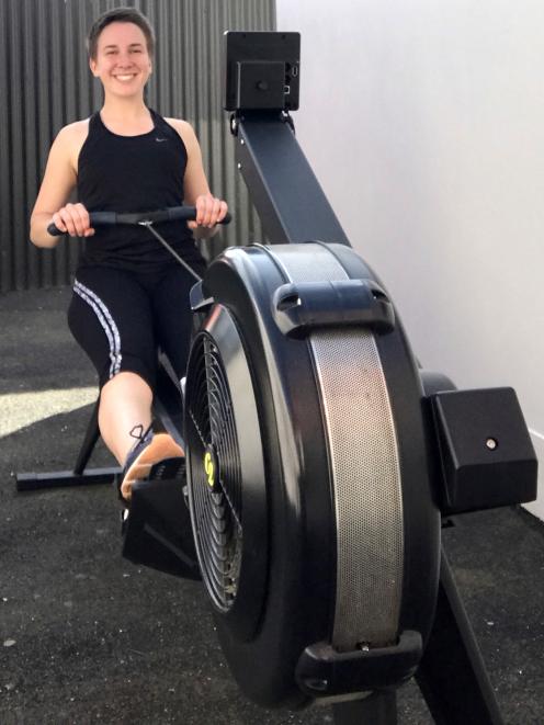 Otago University Rowing club member Hannah Zwalue warms up for the Anzac Day Indoor Rowing...