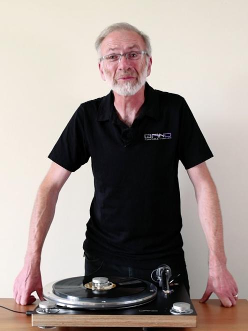 Good vibrations ... Simon Brown stands with the Wand Tonearm and Turntable combination he has...
