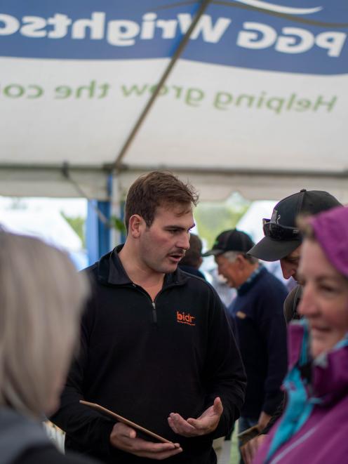 Engaging with farmers ... South Island territory manager for Bidr.co.nz Thomas Mallon connects...