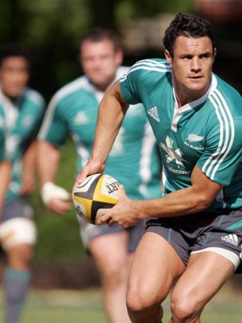 All Black first five-eighth Dan Carter trains at the So Kon Po sports ground in Hong Kong in...