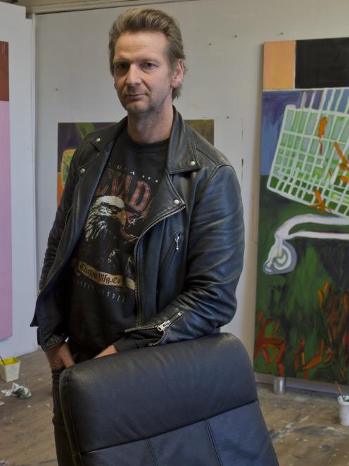 Artist Pete Wheeler takes a break in his make-shift Dowling St studio. PHOTO: GERARD O’BRIEN