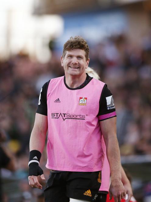 Adam Thomson warms up on the sideline during the Chiefs’ round 6 Super Rugby Aotearoa match...