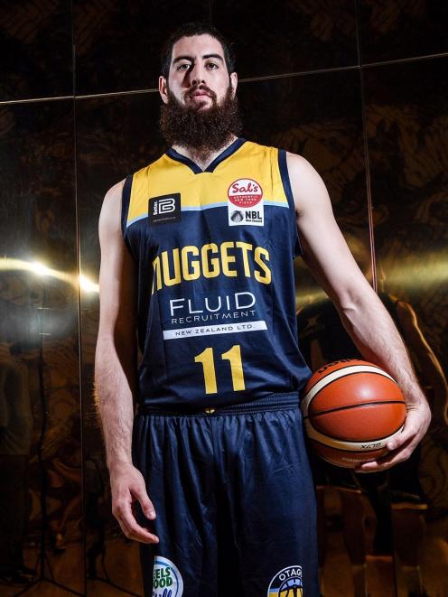 Nuggets player Jordan Ngatai models the new Nuggets uniform. When they return tomorrow night...