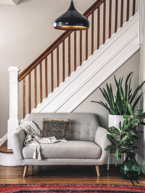 The owners of this home have literally rolled out the red carpet and offered their guests a seat...