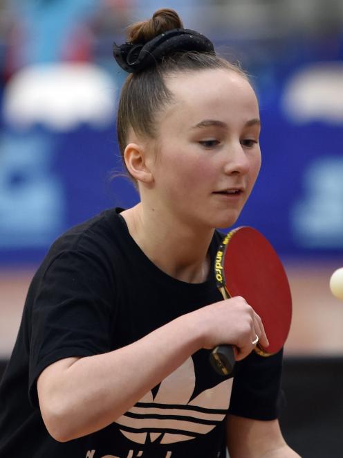 Southland’s Zoe Gray (12) hits the ball during an under-13 doubles final. 