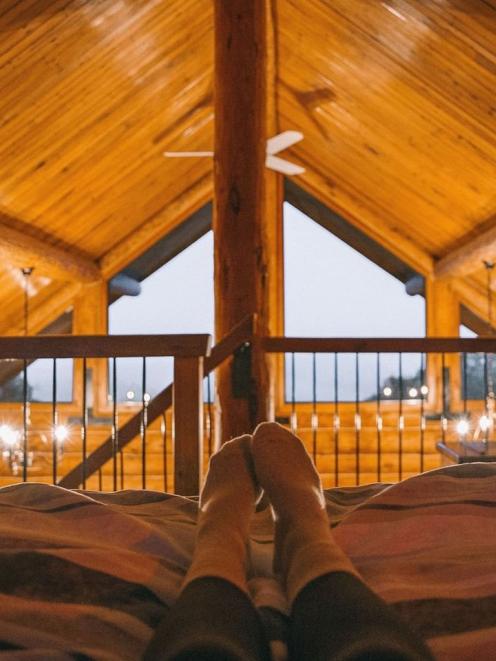 A Fiordland Lodge log cabin provides the perfect end to an adventurous day in the great...