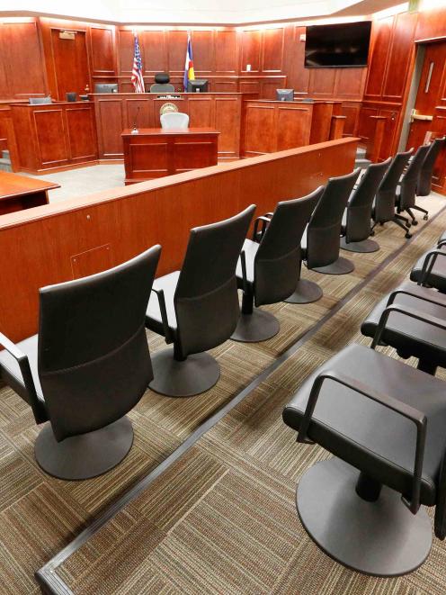 A view of the jury box, right, inside Courtroom 201, where jury selection in the trial of Aurora...