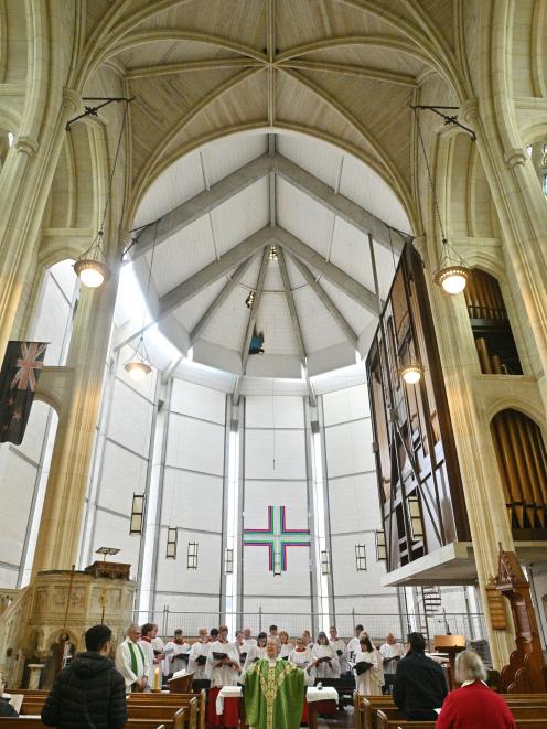 The Rev Barbara Dineen welcomes the congregation back at St Paul’s Cathedral in Dunedin yesterday...