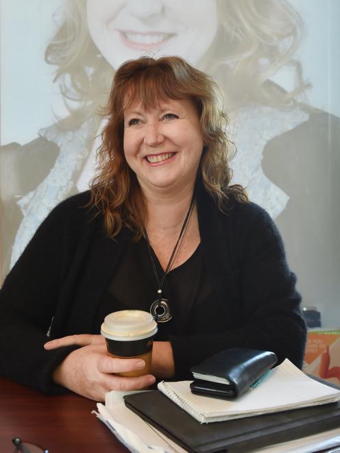 Dunedin South MP Clare Curran with phone, files, paper and coffee. PHOTO: PETER MCINTOSH