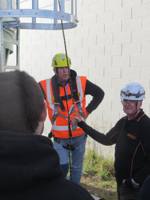 Tutor Jeff Taylor-Hurst, of Compliance Partners, gives instruction on working at height to...