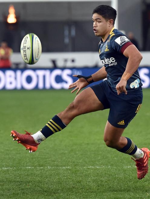 Highlanders’ first five-eighth Josh Ioane puts a kick through during the side’s game against the...