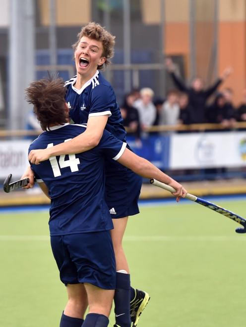 Cromwell College players Ryan Jones (No 14) and William Edwards celebrate Jones’ goal against...