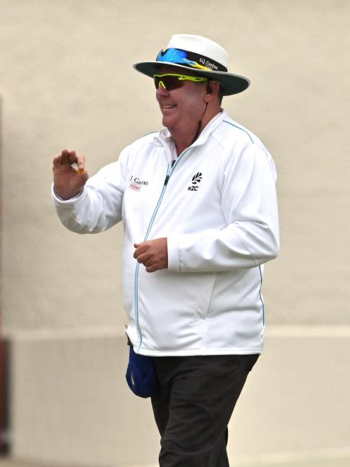 Umpire Derek Walker officiates during the Plunket Shield match between Otago and Central...