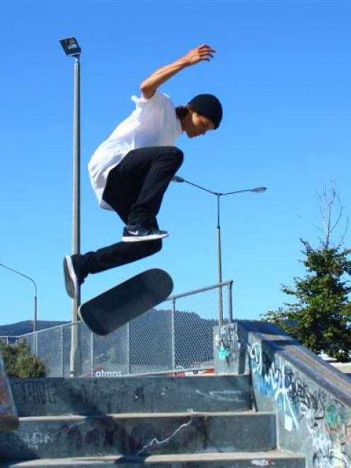 Hang time . . . Skatepark regular Hamish Morgan pulls off a 360 flip at the Thomas Burns St...
